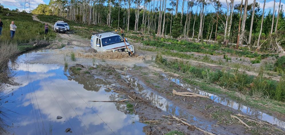 4WD Vehicles On Muddy Road 